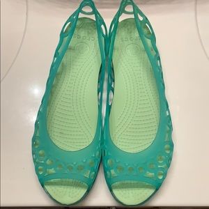 Comfortable teal and green Crocs